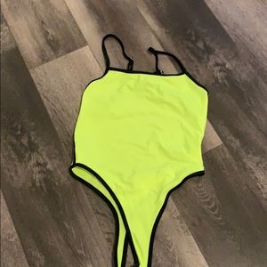 Yellow neon body suit